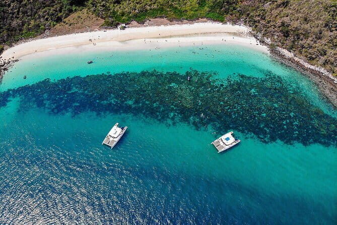 Pattaya: 3 Islands one day trip on Catamaran with Lunch - Koh Phai: clear water, paddleboarding, fishing, and a flybridge slide